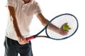 Cropped image of man, tennis player in sportswear holing racket and ball isolated over white background. Sport Royalty Free Stock Photo