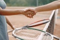 Professional tennis players shaking hands at the net Royalty Free Stock Photo