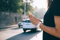 Cropped image of a mobile phone in female hands Royalty Free Stock Photo