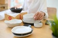 Cropped image, Muslim woman unpacking her cookware from online ordering