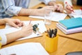 Cropped image of a psychiatrist odr business woman making notes during session Royalty Free Stock Photo