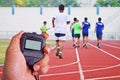 Cropped image of runner on competitive running Royalty Free Stock Photo