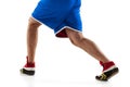 Cropped image of sportsman legs in motionisolated over white background