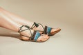 cropped image of woman feet in stylish sandals Royalty Free Stock Photo