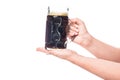 cropped image of woman holding mug of dark beer Royalty Free Stock Photo