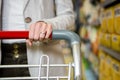 Cropped image of woman pushing trolley Royalty Free Stock Photo