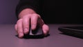 Cropped image of a young man working on his laptop in a coffee shop, rear view of business man hands busy using laptop Royalty Free Stock Photo