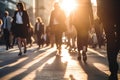 Cropped legs busy city, business people on zebra crossing street, sunset time