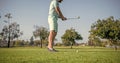 cropped male golf player on professional course with green grass, golf Royalty Free Stock Photo