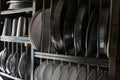 Cropped, partial and close view of kitchen utensils all together display on a residential kitchen rack. Royalty Free Stock Photo