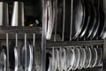Cropped, partial and close view of kitchen utensils all together display on a residential kitchen rack. Royalty Free Stock Photo