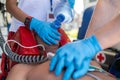 Paramedics doing cardiopulmonary resuscitation on the a critical patient
