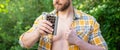 cropped photo of man with bourbon hipflask. man with bourbon hipflask. man with bourbon hipflask Royalty Free Stock Photo