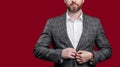 cropped photo of man in formal menswear. formal man wear menswear isolated on red