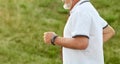 Cropped photo of running old man. Royalty Free Stock Photo