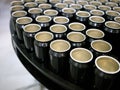 Group of empty beer cans on a platform of a brewery packaging plant