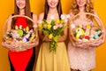 Cropped photo of three funny ladies hold easter baskets bunch family gathering tradition wear fancy dress isolated