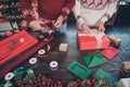 Cropped photo of two handy grandparents prepare packing presents wear ornament pullover home indoors