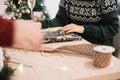 Cropped photo of woman packing Christmas presents Royalty Free Stock Photo
