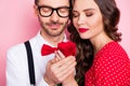 Cropped photo of young attractive couple love feelings romance enjoy date isolated over pink color background Royalty Free Stock Photo