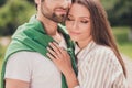 Cropped photo of young couple happy positive smile lovers soulmate husband wife embrace dreamy walk outdoors Royalty Free Stock Photo