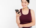 Cropped portrait asian, korean woman,girl is reading pleasant text message on cell phone from her boyfriend during her rest time, Royalty Free Stock Photo