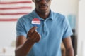 African-American Man Holding I VOTED Sticker Royalty Free Stock Photo