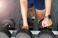 Sportman at fitness.sportman with dumbbells Royalty Free Stock Photo