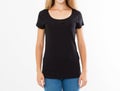 Cropped portrait of young blond woman with beautiful slim body wearing black T-shirt with copy space for your text or advertising