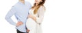 Cropped Portrait of a young pregnant couple on a white background isolated Royalty Free Stock Photo