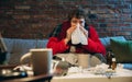 Cropped portrait of young sick boy having hold and flu, allergy. Sneezing, running nose Royalty Free Stock Photo
