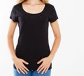 Cropped portrait of young white girl with beautiful slim body wearing black tshirt with copy space for your text or advertising Royalty Free Stock Photo