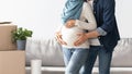 Cropped of pregnant couple posing at new house Royalty Free Stock Photo