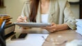 Cropped, An Asian businesswoman using digital tablet at her office desk Royalty Free Stock Photo