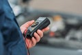 Automechanic using digital multimeter Royalty Free Stock Photo