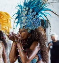 All this glitter is gold. Cropped shot of a beautiful samba dancer performing in a carnival with her band.