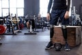 cropped shot of body of disabled man with prosthetic leg standing at gym Royalty Free Stock Photo