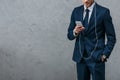 cropped shot of businessman listening music with headphones Royalty Free Stock Photo