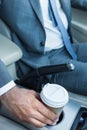 cropped shot of businessman taking coffee to go Royalty Free Stock Photo