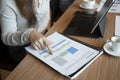 Businesswoman reading report document at office desk. Royalty Free Stock Photo