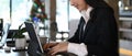 Cropped shot of concentrate young businesswoman working on computer tablet in office.