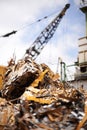 Our waste is a threat to the environment. Cropped shot of a crane at work in a dumpsite. Royalty Free Stock Photo