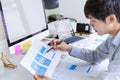 Cropped shot of creative UX UI designer developing programming and coding mobile application from prototype and wireframe layout. Royalty Free Stock Photo