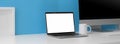 Cropped shot of creative workspace with blank screen laptop, computer and copy space Royalty Free Stock Photo