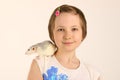 Cropped shot of cute little girl and her pet. Little girl and rat. Royalty Free Stock Photo