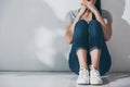 cropped shot of depressed young woman