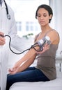 When last have you checked your blood pressure. Cropped shot of a doctor checking his patients blood pressure. Royalty Free Stock Photo