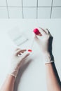 cropped shot of doctor pouring blood from pipette onto blood slide Royalty Free Stock Photo