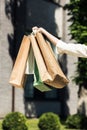 cropped shot of female hand holding shopping bags Royalty Free Stock Photo