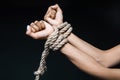 Female hands bound with rope Royalty Free Stock Photo